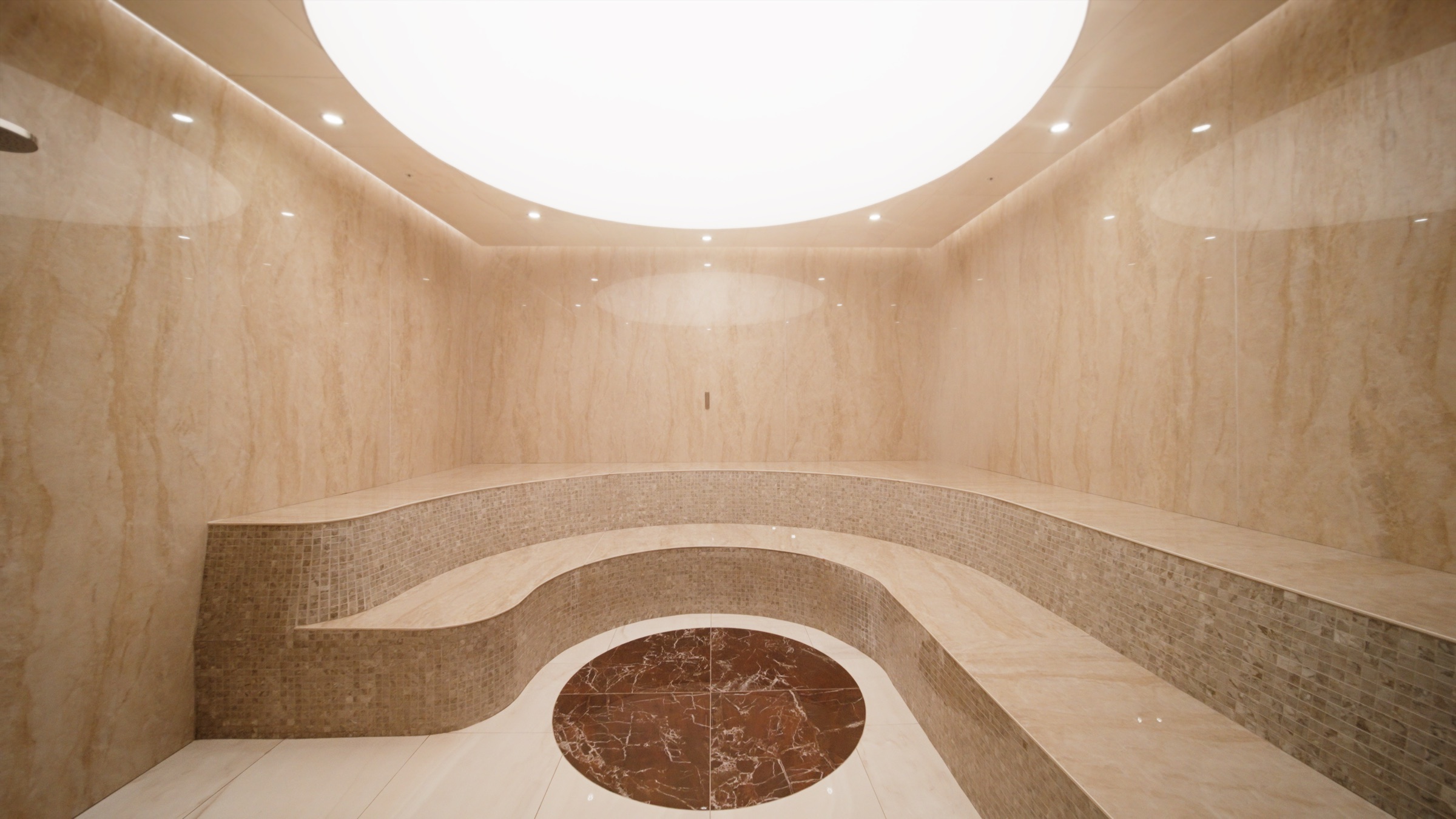 Hammam en marbre crème avec oculus au plafond
